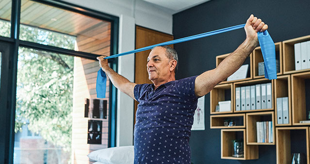 Man doing physical therapy exercises for mild arthritis
